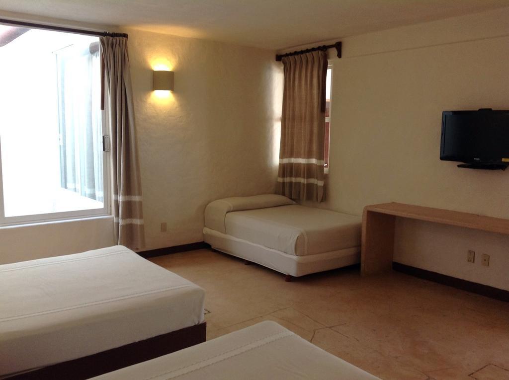 Hotel Plaza Tangolunda المظهر الخارجي الصورة